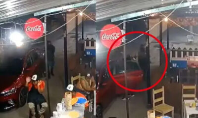 Padre protege a su hijo de bomba molotov en taquería