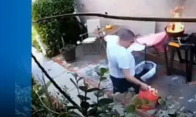 Intenta prender carbón y termina incendiando el patio de su casa; video de hombre se hace viral