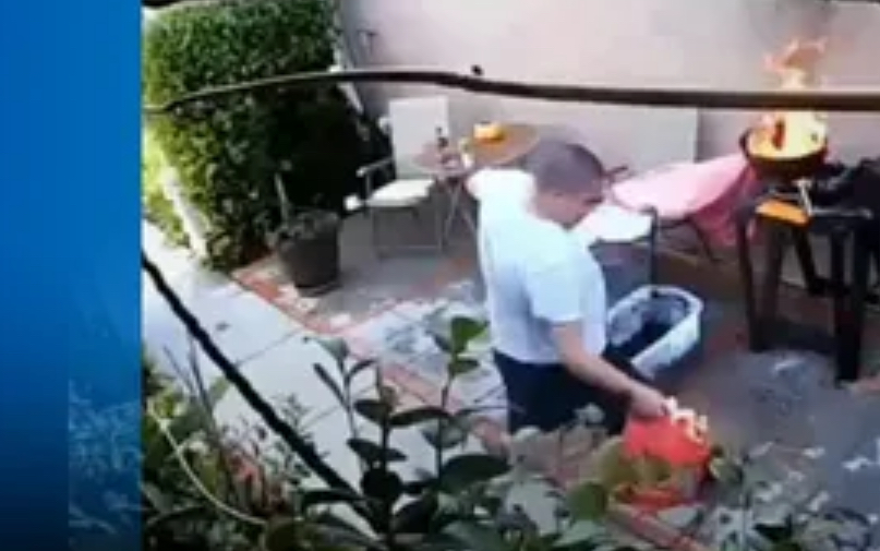 Intenta prender carbón y termina incendiando el patio de su casa; video de hombre se hace viral