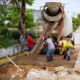 El H. Ayuntamiento de Cosoleacaque repara losas de concreto en el Fraccionamiento Los Mangos.