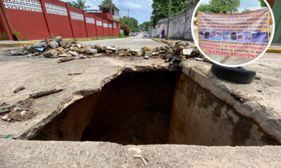 Vecinos de la Oaxaqueña exigen solución a socavón; acusan que colapsó línea del Complejo Petroquímico, causando destrozos