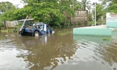*Autos varados, grúa en canal a cielo abierto e inundaciones en varias calles de Coatzacoalcos, es el reporte de lluvias por el frente frío 12 estacionado en el sur *